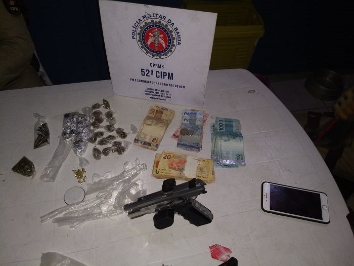 Pistola dinheiro e drogas encontrados com traficante